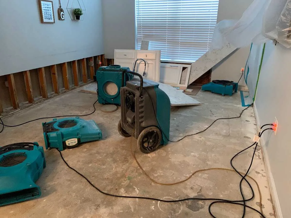 Dehumidifier in flood-cut room for Water Damage Restoration in Pittsboro