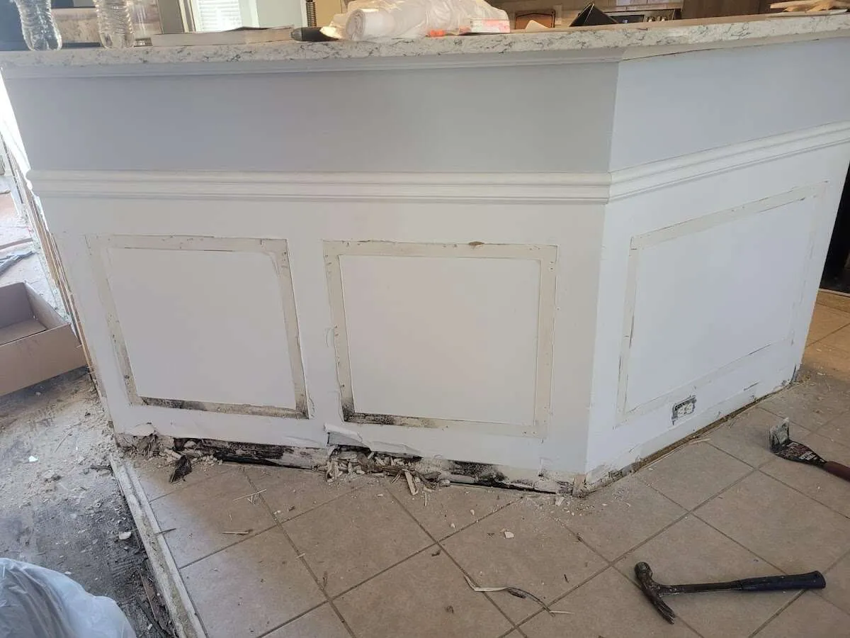 Water damage and mold on kitchen during Storm Damage Restoration in Pittsboro